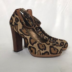 Leopard Print ankle strap wood heels.